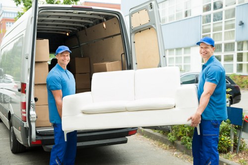 Man and a van moving boxes and furniture in Ilford with transparent pricing