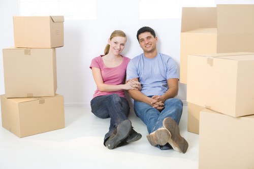 Local packing team organising boxes for a move in Ilford