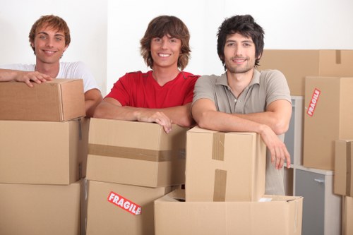 Professional Ilford moving service handling furniture carefully