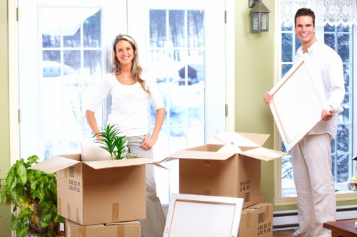 Packed boxes and furniture ready for removal truck transport