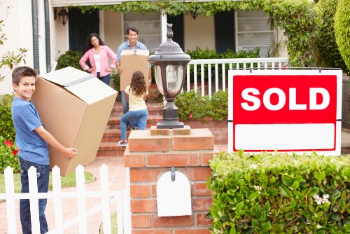 Careful loading of furniture and boxes for a student move in Ilford